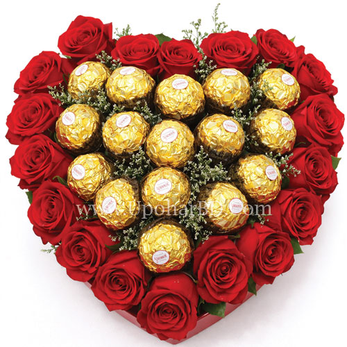 Red Heart of chocolates and flowers